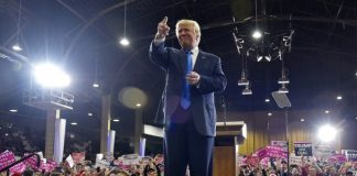 In first rally since shooting, Trump claims he took bullet for democracy