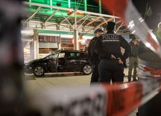 Suspect who drove car into a German Christmas market held on murder charges